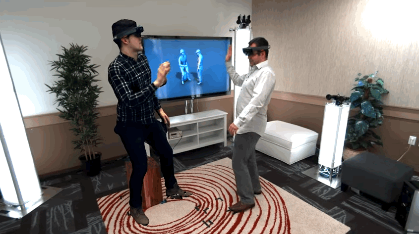 The man on the left is a 3D print using the Microsoft Holoportation technology.