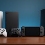 Top gaming consoles with controllers and game cases arranged on a modern entertainment center